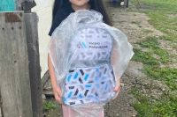 Более 100 детей получили рюкзаки с подарками от разреза Майрыхский