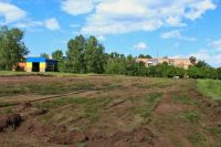 На въезде в Минусинск к юбилею города строят огромную парковку на 900 автомобилей