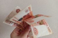 Дочь умоляла собрать деньги: жительница Хакасии завернула деньги в полотенце и отдала неизвестному